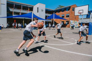 DE LA SALLE Caringbah Sporting Facilities students playing basketball